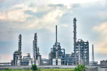 Close-up of pipelines and destillation tanks of an oil-refinery