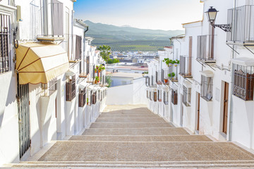 Beautiful and typical street in Osuna. Ducal town declared a Historic-Artistic Site. Province of Seville. Southern Spain. Picturesque travel destination on Spain.