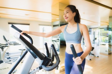 Portrait asian woman exercising and work out in gym