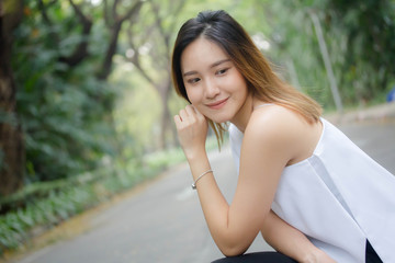 Portrait of thai adult beautiful girl relax and smile