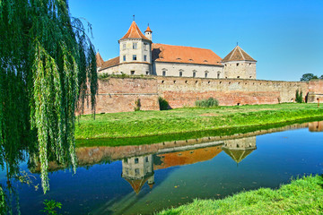 Summer scene with mirroring fortress
