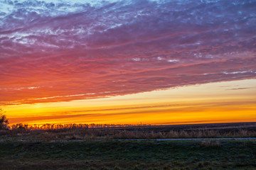 Bright sun and clouds.