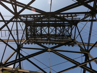 The pylon of the cableway that connects the towns of Albino and Selvino. Green painted pylons to camouflage them in the woods