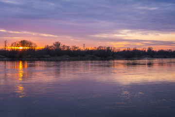 Evening sky above Vistula River seen from a bank in Wasaw, Poland