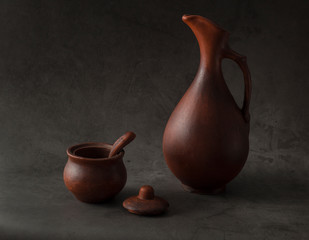 still life with pottery in low key style