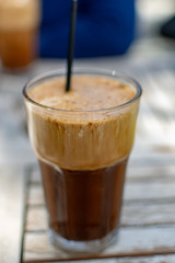 Traditional greek cold coffee Frappe made from water, instant coffee and ice cubes