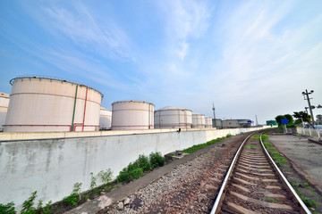 Fototapeta na wymiar Big white gasoline and oil industry background of railway transportation of storage tanks