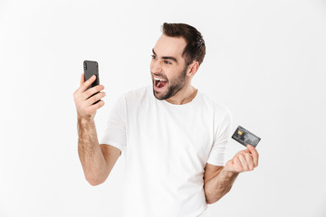 Handsome cheerful man wearing blank t-shirt