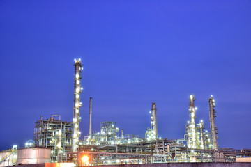 Close-up of pipelines and destillation tanks of an oil-refinery plant