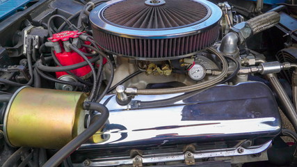 16902_Closer_look_of_the_new_car_engine_on_the_parking_lot.jpg