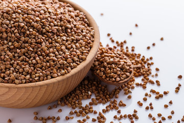 Grain buckwheat on a white acrylic background