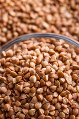 Grain buckwheat on a dark stone background