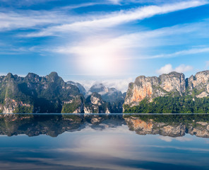 Beautiful mountain landscape and reflection on water in Ratchaprapa Dam and Cheow Larn Lake , Khao Sok, Surat Thani province, Amazing and Unseen place in Thailand