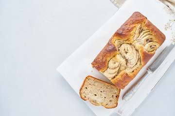 Banana bread, copy space. Cake with banana. Top view. The morning Breakfast on light grey background