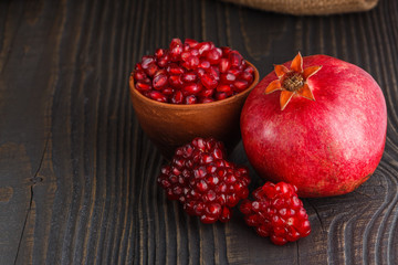 grains of a grenade on a dark rustic background
