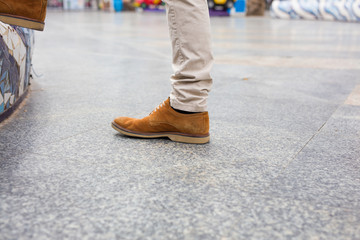 brown mocassins in the city