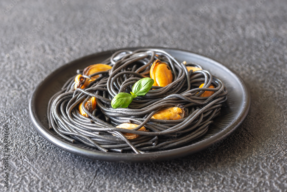 Sticker Black pasta with mussels and parmesan