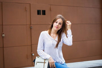 young woman happy in th city