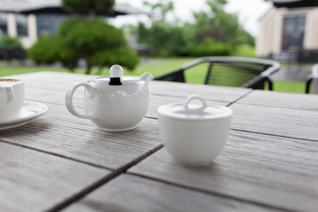 White teapot and cup