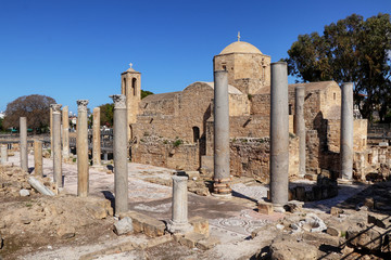 Historical ruins and columns of earlz Bzyantine Chrysopolitissa church (Agia Kyriaki Chrysopolitissa) in Kato Paphos. Southern Cyprus, Paphos. St Kyriaki. Ruins and blue sky. Summer travel. St. Paul's