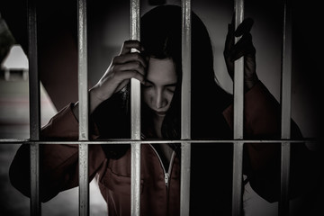 Hands of women desperate to catch the iron prison,prisoner concept,thailand people,Hope to be...