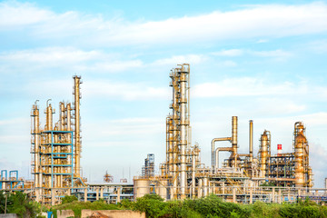 Fototapeta premium Refinery plant under the background of blue sky white clouds