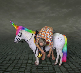 The drunk man with a bottle of rum is lying across the unicorn saddle.
