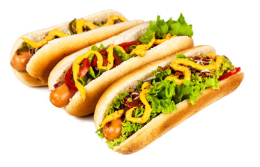 Delicious hotdogs on white background