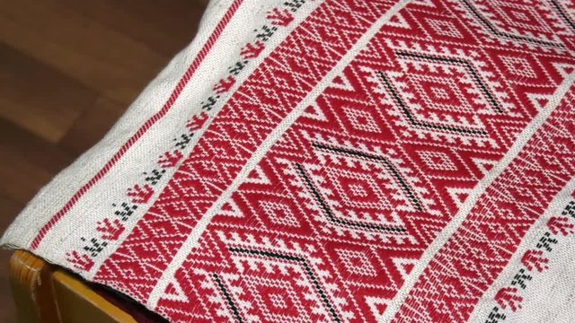 Traditional red and black patterns from the countryside. Hand woven fabric.