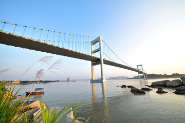 Urban traffic bridge on the water