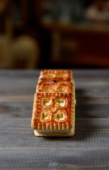 Cookies with marshmallows and marmalade on the table. Fresh homemade pastries.