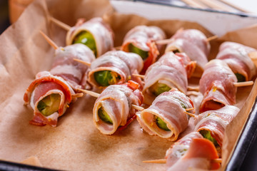 fresh green Brussels sprouts wrapped in fragrant smoked bacon