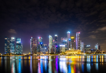 Fototapeta na wymiar 2019 February 28, Singapore - Cityscape night scenery of colorful the buildings in downtown.