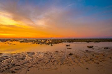 Fototapeta na wymiar Beautiful Seascape with Sunrise on the Beach in Phuket - THAILAND