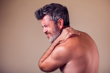 Fototapeta premium Man with neck pain. People, health care, medicine concept