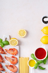 Raw ingredients for cooking: Shrimp prawns Italian spaghetti pasta