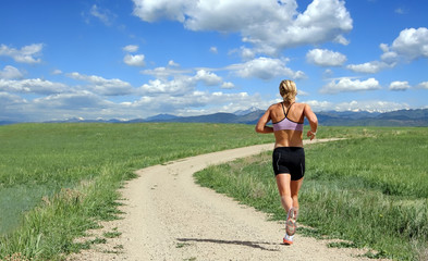 Woman runner on an outdoor trail