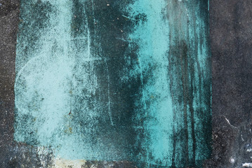 colorful black and turquoise scratchy, painted wall