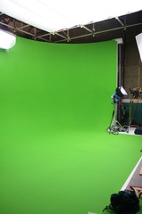 An empty green screen visual effects studio