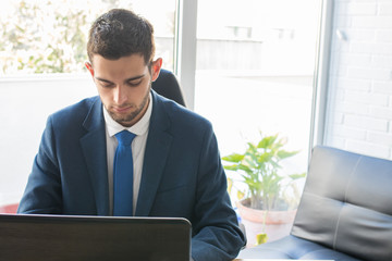 business man in the office with computer