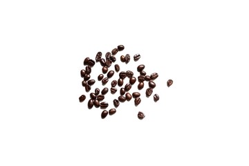 In selective focus many dark roasted coffee beans on white isolated background 