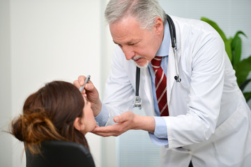 Doctor visiting a patient eye