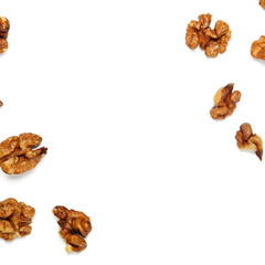 Walnuts peeled on a white background isolated. Frame background for instagram. Copy space, top view, flat lay.