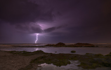 Thunderstorm on mediterranean sea beach