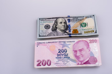 American dollar banknotes and Turksh Lira banknotes side by side