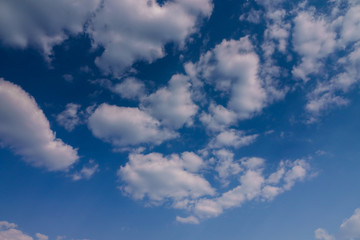 Blue sky air background with white clouds