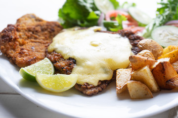 Traditional milanese beef and french fries