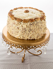Italian Cream Cake on Jeweled Cake Stand with Copy Space