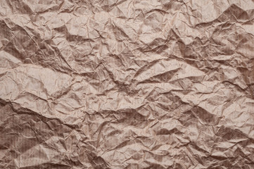 Crumpled kraft paper. Texture crumpled recycled old paper.