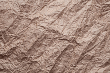 Crumpled kraft paper. Texture crumpled recycled old brown paper.